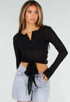 Zwarte Top met Knoopsluiting, Strik en Lange Mouwen