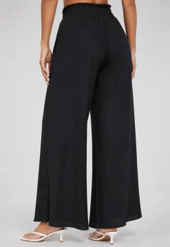 Zwarte Wide Leg Broek met Smock Taille en Strikkoord